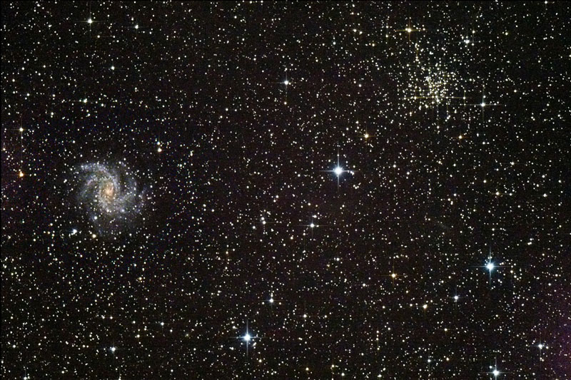 The Firework Galaxy and Open Cluster.